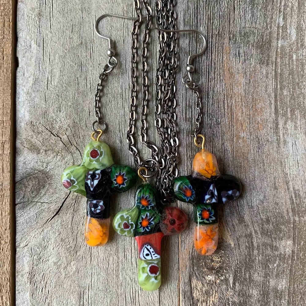 Women's set of earrings and a Necklace.